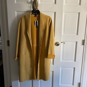 Joan Vass mustard overcoat